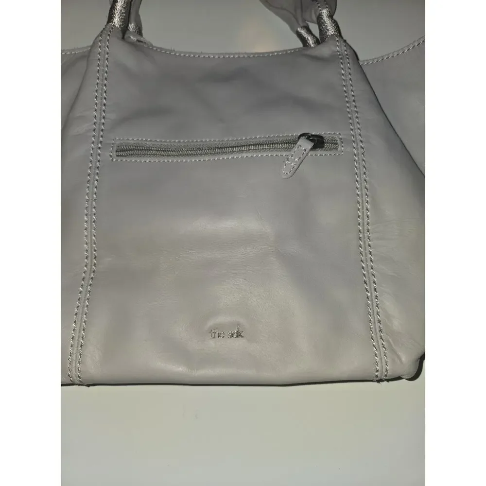 The Sak Gray Leather Tote Shoulder Bag Handbag Tassel Pockets Magnetic Closure